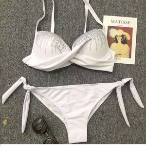 White 2 piece swim suit with bling on the top